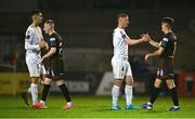 6 September 2024; Bohemians players Ross Tierney, left, and Dawson Devoy shake hands with Shelbourne players Shane Griffin, left, and Kameron Ledwidge after the SSE Airtricity Men's Premier Division match between Bohemians and Shelbourne at Dalymount Park in Dublin. Photo by Seb Daly/Sportsfile