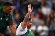 7 September 2024; Britney Arendse of Ireland with coach and father Denver Arendse after her third lift in the women's 79kg final on day ten of the Paris 2024 Paralympic Games at Porte de la Chapelle Arena in Paris, France. Photo by Harry Murphy/Sportsfile