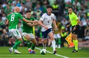 7 September 2024; Declan Rice of England gets past Will Smallbone and Dara O'Shea of Republic of Ireland during the UEFA Nations League B Group 2 match between Republic of Ireland and England at Aviva Stadium in Dublin. Photo by Stephen McCarthy/Sportsfile