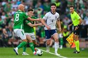 7 September 2024; Declan Rice of England gets past Will Smallbone and Dara O'Shea of Republic of Ireland during the UEFA Nations League B Group 2 match between Republic of Ireland and England at Aviva Stadium in Dublin. Photo by Stephen McCarthy/Sportsfile