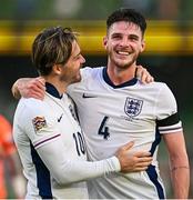 7 September 2024; Jack Grealish, left, and Declan Rice of England celebrate at the final whistle of the UEFA Nations League B Group 2 match between Republic of Ireland and England at the Aviva Stadium in Dublin. Photo by Seb Daly/Sportsfile