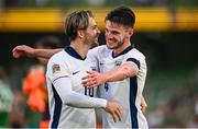 7 September 2024; Jack Grealish, left, and Declan Rice of England celebrate at the final whistle of the UEFA Nations League B Group 2 match between Republic of Ireland and England at the Aviva Stadium in Dublin. Photo by Seb Daly/Sportsfile