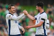 7 September 2024; Jack Grealish, left, and Declan Rice of England celebrate after the UEFA Nations League B Group 2 match between Republic of Ireland and England at Aviva Stadium in Dublin. Photo by Stephen McCarthy/Sportsfile