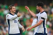 7 September 2024; Jack Grealish, left, and Declan Rice of England celebrate after the UEFA Nations League B Group 2 match between Republic of Ireland and England at Aviva Stadium in Dublin. Photo by Stephen McCarthy/Sportsfile