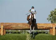 17 August 2004; Ireland's Sasha Harrison, on All Love Du Fenaud, clears the fence at the water jump, during the Cross Country discipline of the 3 Day Eventing Competition. Markopoulo Olympic Equestrian Centre. Games of the XXVIII Olympiad, Athens Summer Olympics Games 2004, Athens, Greece. Picture credit; Brendan Moran / SPORTSFILE