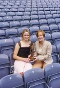 17 August 2004; Jocelyn Emerson, Lucozade Sport, right, presents the Lucozade Sport Irish Independent Ladies Gaelic Footballer of the Month for July to Dublin's Fiona Corcoran. Croke Park, Dublin. Picture credit; Brian Lawless / SPORTSFILE