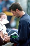 17 August 2004; Roy Keane, Republic of Ireland, signs autographs for fans at the end of squad training. Malahide FC, Malahide, Co. Dublin. Picture credit; David Maher / SPORTSFILE