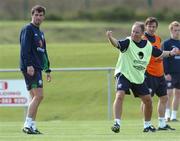 17 August 2004; Brian Kerr, Republic of Ireland manager, points the way as Roy Keane and David Connolly look on during squad training. Malahide FC, Malahide, Co. Dublin. Picture credit; David Maher / SPORTSFILE