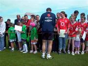 17 August 2004; Roy Keane, Republic of Ireland, signs autographs for fans at the end of squad training. Malahide FC, Malahide, Co. Dublin. Picture credit; David Maher / SPORTSFILE