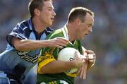 14 August 2004; John Crowley, Kerry, in action against Barry Cahill, Dublin. Bank of Ireland Senior Football Championship Quarter-Final, Dublin v Kerry, Croke Park, Dublin. Picture credit; Ray McManus / SPORTSFILE