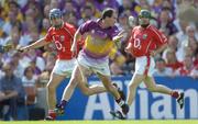 15 August 2004; Adrian Fenlon, Wexford, in action against Kieran Murphy, left, and Jerry O'Connor. Guinness Senior Hurling Championship Semi-Final, Wexford v Cork, Croke Park, Dublin. Picture credit; Ray McManus / SPORTSFILE