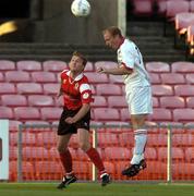 20 August 2004; Thomas Heary, Bohemians, in action against Martin Reilly, Kildare County. FAI Carlsberg Cup, Bohemians v Kildare County, Dalymount Park, Dublin. Picture credit; Brian Lawless / SPORTSFILE
