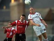 20 August 2004; Glen Crowe, Bohemians, in action against Ray Kenny, Kildare County. FAI Carlsberg Cup, Bohemians v Kildare County, Dalymount Park, Dublin. Picture credit; Brian Lawless / SPORTSFILE