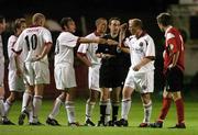 20 August 2004; Bohemians' Thomas Heary, second from right, reacts after referee Ian Stokes had shown him the red card. FAI Carlsberg Cup, Bohemians v Kildare County, Dalymount Park, Dublin. Picture credit; Brian Lawless / SPORTSFILE
