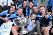 23 September 2013; Owen French, age 8, from Ringsend, with Dublin players, from left, Michael Darragh MacAuley, Ciaran Kilkenny, Denis Bastick, Kevin Nolan, Cormac Costello, and Jack McCaffrey with the Sam Maguire cup on a visit by the All-Ireland Senior Football Champions to Our Lady's Hospital for Sick Children, Crumlin. Picture credit: Brian Lawless / SPORTSFILE