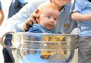 23 September 2013; Nicholas Clarke, age 6 months, from Rathgar, sits in the Sam Maguire cup on a visit by the All-Ireland Senior Football Champions to Our Lady's Hospital for Sick Children, Crumlin. Picture credit: Brian Lawless / SPORTSFILE