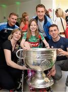 23 September 2013; Mayo supporter Niamh O'Neill and her mother Stella, from Ballyhaunis, Co. Mayo, with Dublin players, from left, Ciaran Kilkenny, Kevin Nolan, and Cormac Costello with the Sam Maguire cup on a visit by the All-Ireland Senior Football Champions to Our Lady's Hospital for Sick Children, Crumlin. Picture credit: Brian Lawless / SPORTSFILE