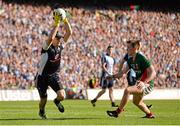 22 September 2013; Dublin goalkeeper Stephen Cluxton in action against Cillian O'Connor, Mayo. GAA Football All-Ireland Senior Championship Final, Dublin v Mayo, Croke Park, Dublin. Picture credit: Stephen McCarthy / SPORTSFILE