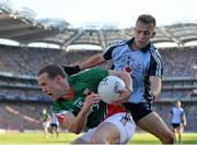 22 September 2013; Andy Moran, Mayo, is tackled by Jonny Cooper, Dublin. GAA Football All-Ireland Senior Championship Final, Dublin v Mayo, Croke Park, Dublin. Picture credit: Stephen McCarthy / SPORTSFILE