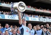 22 September 2013; Ciaran Kilkenny, Dublin, lifts the Sam Maguire cup. GAA Football All-Ireland Senior Championship Final, Dublin v Mayo, Croke Park, Dublin. Picture credit: Ray McManus / SPORTSFILE