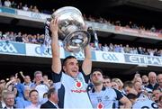 22 September 2013; Kevin O'Brien, Dublin, lifts the Sam Maguire cup. GAA Football All-Ireland Senior Championship Final, Dublin v Mayo, Croke Park, Dublin. Picture credit: Ray McManus / SPORTSFILE