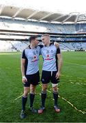 22 September 2013; Bernard Brogan, who scored 2 - 3 for Dublin, relaxes with Eoghan O'Gara, 2 points, on the pitch after the game. GAA Football All-Ireland Senior Championship Final, Dublin v Mayo, Croke Park, Dublin. Picture credit: Ray McManus / SPORTSFILE