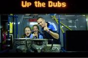 23 September 2013; Lizzy O'Callighan, aged 12, and Zoe Duff, aged 13, both from Clontarf, on the dublin team bus with Dublin's Dean Rock after the homecoming celebrations of the All-Ireland Senior Football Champions. Merrion Square, Dublin. Photo by Sportsfile