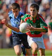 22 September 2013; Michael Kiely, from Scoil Mhuire N.S. Dungarvan, Waterford, representing Mayo, in action against Gavin Brady, from Mullahoran N.S. Kilcogy, Cavan, representing Dublin. INTO/RESPECT Exhibition GoGames during the GAA Football All-Ireland Senior Championship Final between Dublin and Mayo, Croke Park, Dublin. Picture credit: David Maher / SPORTSFILE