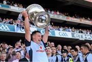 22 September 2013; Philip McMahon, Dublin, lifts the Sam Maguire cup. GAA Football All-Ireland Senior Championship Final, Dublin v Mayo, Croke Park, Dublin. Picture credit: Ray McManus / SPORTSFILE