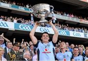 22 September 2013; Diarmuid Connolly, Dublin, lifts the Sam Maguire Cup. GAA Football All-Ireland Senior Championship Final, Dublin v Mayo, Croke Park, Dublin. Picture credit: Ray McManus / SPORTSFILE