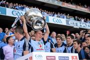 22 September 2013; Dublin's Darren Daly lifts the Sam Maguire cup. GAA Football All-Ireland Senior Championship Final, Dublin v Mayo, Croke Park, Dublin. Picture credit: Ray McManus / SPORTSFILE