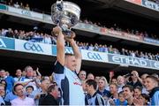 22 September 2013; Dublin's Eoghan O'Gara lifts the Sam Maguire cup. GAA Football All-Ireland Senior Championship Final, Dublin v Mayo, Croke Park, Dublin. Picture credit: Ray McManus / SPORTSFILE