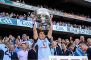 22 September 2013; Dublin's Michael Fitzsimons lifts the Sam Maguire cup. GAA Football All-Ireland Senior Championship Final, Dublin v Mayo, Croke Park, Dublin. Picture credit: Ray McManus / SPORTSFILE