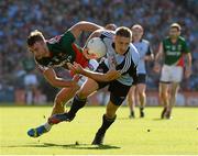 22 September 2013; Eoghan O'Gara, Dublin, in action against Aidan O'Shea, Mayo. GAA Football All-Ireland Senior Championship Final, Dublin v Mayo, Croke Park, Dublin. Picture credit: Ray McManus / SPORTSFILE