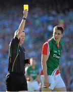 22 September 2013; Referee Joe McQuillan shows a yellow card to Lee Keegan, Mayo. GAA Football All-Ireland Senior Championship Final, Dublin v Mayo, Croke Park, Dublin. Picture credit: Brendan Moran / SPORTSFILE