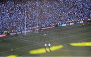 22 September 2013; The match umpires leave the pitch as a dejected Chris Barrett and goalkeeper Robert Hennelly, Mayo, react after the final whistle. GAA Football All-Ireland Senior Championship Final, Dublin v Mayo, Croke Park, Dublin. Picture credit: Brendan Moran / SPORTSFILE