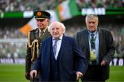 7 September 2024; President of Ireland Michael D Higgins accompanied by FAI president Paul Cooke before the UEFA Nations League B Group 2 match between Republic of Ireland and England at Aviva Stadium in Dublin. Photo by Stephen McCarthy/Sportsfile