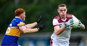 8 September 2024; Brian Fenton of Raheny in action against Rob Shaw of Castleknock during the Dublin County Senior 1 Club Football Championship Group 2 match between Castleknock and Raheny at Parnell Park in Dublin. Photo by Piaras Ó Mídheach/Sportsfile