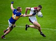 8 September 2024; Brian Fenton of Raheny in action against Tom Shields of Castleknock the Dublin County Senior 1 Club Football Championship Group 2 match between Castleknock and Raheny at Parnell Park in Dublin. Photo by Piaras Ó Mídheach/Sportsfile