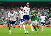 7 September 2024; Jayson Molumby of Republic of Ireland in action against England players, from left, Trent Alexander-Arnold, Harry Kane and Declan Rice during the UEFA Nations League B Group 2 match between Republic of Ireland and England at Aviva Stadium in Dublin. Photo by Stephen McCarthy/Sportsfile