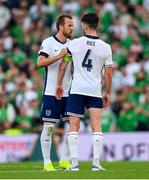 7 September 2024; Harry Kane temporarily puts the England captain's armband on the arm of team-mate Declan Rice, right, during the UEFA Nations League B Group 2 match between Republic of Ireland and England at Aviva Stadium in Dublin. Photo by Stephen McCarthy/Sportsfile