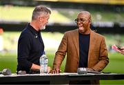 7 September 2024; ITV pundits Roy Keane, left, and Ian Wright share a joke before the UEFA Nations League B Group 2 match between Republic of Ireland and England at Aviva Stadium in Dublin. Photo by Ben McShane/Sportsfile