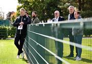 9 September 2024; Head coach Heimir Hallgrimsson with, from left, Gavin Cooney of The42.ie, Nathan Murphy of OffTheBall, Philip Quinn of The Irish Daily Mail, FAI international and high performance committee Packie Bonner and John Fallon of The Irish Examiner during a Republic of Ireland training session at the FAI National Training Centre in Abbotstown, Dublin. Photo by Stephen McCarthy/Sportsfile