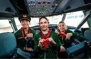 9 September 2024; Paralympics Ireland athlete Katie-George Dunlevy, centre, with pilots Eve McCrystal, left, and Linda Kelly, on arrival into Dublin on EI 525 from Paris with Aer Lingus, Official Airline Partner to Paralympics Ireland. The triumphant team were welcomed by an Aer Lingus guard of honour and were greeted by family, friends and supporters at arrivals. Aer Lingus is proud to have brought Team Ireland, thousands of supporters, and #HomeAdvantage to Paris throughout the competition. Photo by Ramsey Cardy/Sportsfile