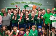 9 September 2024; Paralympics Ireland athletes, from left, Róisín Ní Riain, Linda Kelly, Eve McCrystal, Orla Comerford and Katie-George Dunlevy on arrival into Dublin on EI 525 from Paris with Aer Lingus, Official Airline Partner to Paralympics Ireland. The triumphant team were welcomed by an Aer Lingus guard of honour and were greeted by family, friends and supporters at arrivals. Aer Lingus is proud to have brought Team Ireland, thousands of supporters, and #HomeAdvantage to Paris throughout the competition. Photo by David Fitzgerald/Sportsfile