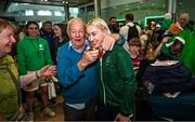 9 September 2024; Paralympics Ireland athlete Orla Comerford with her grand-uncle Eamonn on arrival into Dublin on EI 525 from Paris with Aer Lingus, Official Airline Partner to Paralympics Ireland. The triumphant team were welcomed by an Aer Lingus guard of honour and were greeted by family, friends and supporters at arrivals. Aer Lingus is proud to have brought Team Ireland, thousands of supporters, and #HomeAdvantage to Paris throughout the competition. Photo by David Fitzgerald/Sportsfile