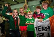 9 September 2024; Paralympics Ireland athlete Orla Comerford with supporters on arrival into Dublin on EI 525 from Paris with Aer Lingus, Official Airline Partner to Paralympics Ireland. The triumphant team were welcomed by an Aer Lingus guard of honour and were greeted by family, friends and supporters at arrivals. Aer Lingus is proud to have brought Team Ireland, thousands of supporters, and #HomeAdvantage to Paris throughout the competition. Photo by David Fitzgerald/Sportsfile