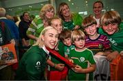 9 September 2024; Paralympics Ireland athlete Orla Comerford with supporters on arrival into Dublin on EI 525 from Paris with Aer Lingus, Official Airline Partner to Paralympics Ireland. The triumphant team were welcomed by an Aer Lingus guard of honour and were greeted by family, friends and supporters at arrivals. Aer Lingus is proud to have brought Team Ireland, thousands of supporters, and #HomeAdvantage to Paris throughout the competition. Photo by David Fitzgerald/Sportsfile