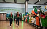 9 September 2024; Paralympics Ireland athletes Orla Comerford, left, and Róisín Ní Riain on arrival into Dublin on EI 525 from Paris with Aer Lingus, Official Airline Partner to Paralympics Ireland. The triumphant team were welcomed by an Aer Lingus guard of honour and were greeted by family, friends and supporters at arrivals. Aer Lingus is proud to have brought Team Ireland, thousands of supporters, and #HomeAdvantage to Paris throughout the competition. Photo by David Fitzgerald/Sportsfile