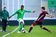 10 September 2024; Aidomo Emakhu of Republic of Ireland in action against Ralfs Maslovs of Latvia during the UEFA European U21 Championship qualifier match between Republic of Ireland and Latvia at Tallaght Stadium in Dublin. Photo by Tyler Miller/Sportsfile